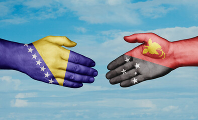 Papua New Guinea and Bosnia and Herzegovina country handshaking with flags, consensus concept international co-operation illustration