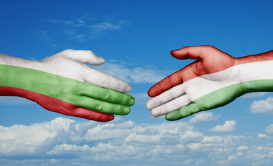 Hungary and Bulgaria country handshaking with flags, consensus concept international co-operation illustration