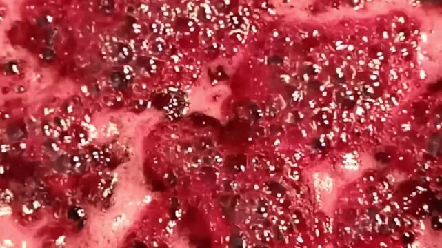 detail shot of boiling cherry jam