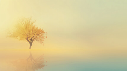 Solitary tree with autumn leaves reflected in a calm lake under a hazy sky. The soft, pastel colors create a serene and dreamlike atmosphere