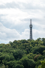 Obraz premium Petrin lookout steel framework tower built in 1891, resembling small Eiffel Tower, on Petrin hill in Prague, Czech Republic