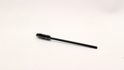 Black eyelash comb