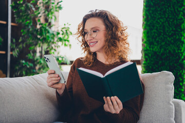 Photo of charming lovely successful woman wear stylish clothes hold book work from home cozy living...