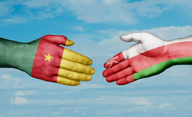 Oman and Cameroon country handshaking with flags, consensus concept international co-operation illustration