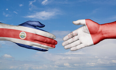 Malta and Costa Rico country handshaking with flags, consensus concept international co-operation illustration