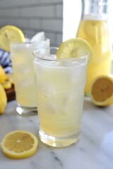 Fototapeta premium Refreshing Lemonade with Lemon Slices and Ice
