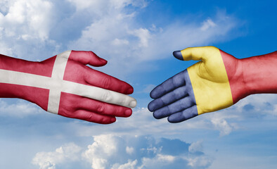 Romania and Denmark country handshaking with flags, consensus concept international co-operation illustration