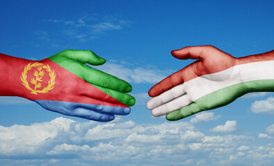 Hungary and Eritrea country handshaking with flags, consensus concept international co-operation illustration