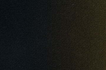dark black texture background fabric material background wallpaper surface with slightly gradient of blue and yellow colors
