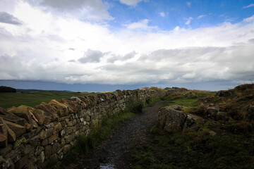 Hadrian Wall view by cloudy noon, Northern England