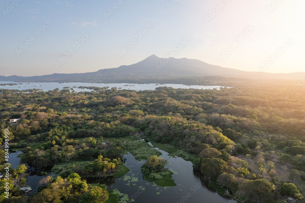 Wall mural mombacho volcano on sunset light