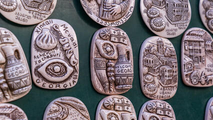 various souvenirs and magnets sold by street vendors throughout Georgia.