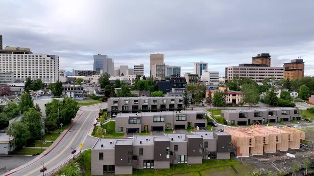 fast aerial push into the anchorage alaska skyline