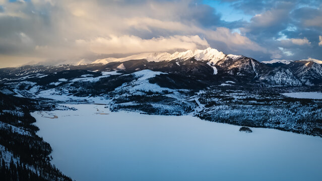 Snow-covered mountain range at sunrise in Dillon, Colorado