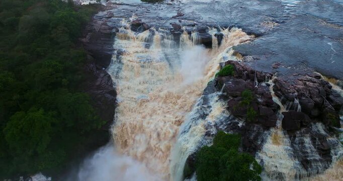 Gushing Waterfalls Of El Sapo And Hacha Falls During Sunset In The Canaima National Park In Venezuela. Aerial Shot