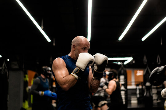 Boxers fighting in boxing training in the gym.