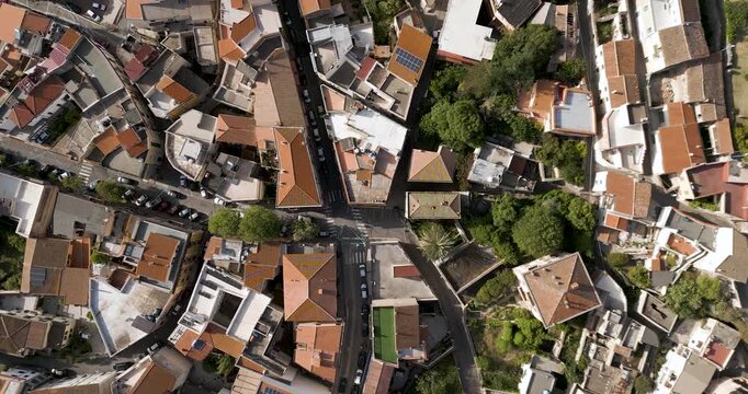 Top View Of Typical Buildings And Streets In Dorgali, Sardinia, Italy. aerial rotating shot
