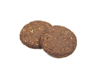 Two dark grain integral cookies isolated on white background. Healthy chocolate crunchy snack biscuits 