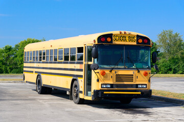 Older School Bus Sits Parked For The Summer Vacation © Carolyn Franks