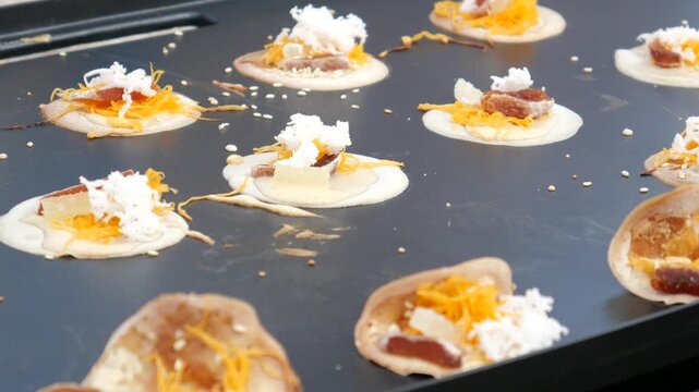Making Khanom Buang (Thai crispy pancakes or crispy crepes), Traditional Thai snack