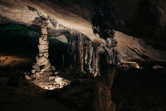Lights illuminate the dark Kong Lor Cave in Phu Hin Bun National Park, Laos; Khammouane Province, Laos