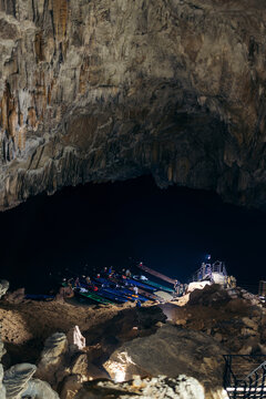 Tourists arrive in boats into Kong Lor Cave in Phu Hin Bun National Park, Laos; Khammouane Province, Laos