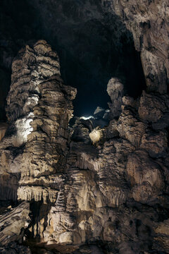 Lights illuminate the geological wonder of Kong Lor Cave in Phu Hin Bun National Park, Laos; Khammouane Province, Laos