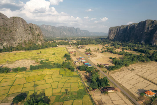Limestone karst and rice fields in a valley near Kong Lor Cave in Laos; Khammouane Province, Laos