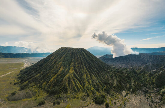 Mount Batok and steam from the crater of Mount Bromo in Bromo Tengger Semeru National Park in East Java, Indonesia; Ranupani, East Java, Indonesia