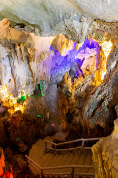 Coloured lights illuminating the interior of Tham Luong Cave in Ha Giang, Vietnam; Minh Tan, Vi Xuyen, Ha Giang, Vietnam