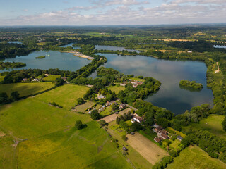 Panoramic view of Blashford Lakes Nature Reserve in New Forest UK. Recreational sailing on the lake...
