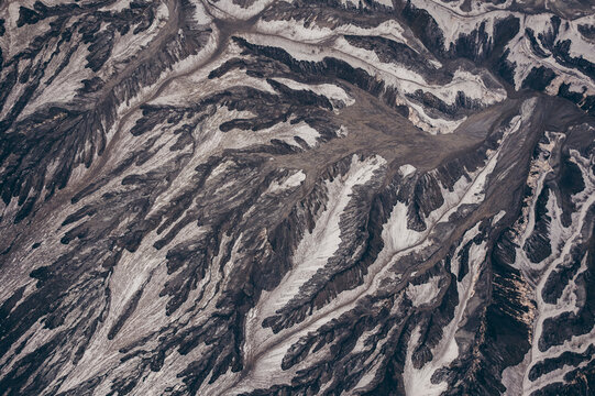 Grey and white rock formations on a rugged mountainside in Bromo Tengger Semeru National Park in Indonesia; Ranupani, East Java, Indonesia