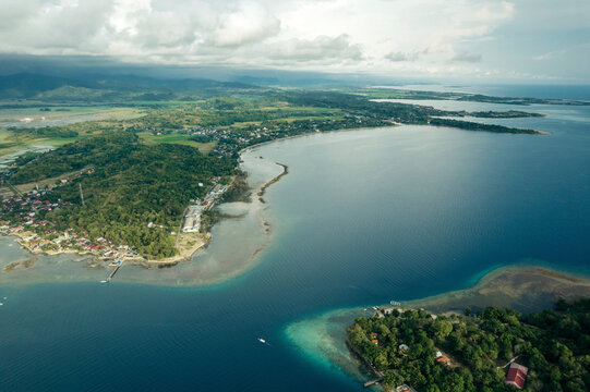 Aerial view over Dutungan Island and the coastline of Sulawesi Selatan, Indonesia; Dutungan Island, Kecamatan Mallusetasi, Kabupaten Barru, Sulawesi Selatan, Indonesia