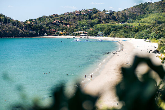 White sand beach along a beautiful tropical coastline; Koh Lanta, Krabi, Thailand