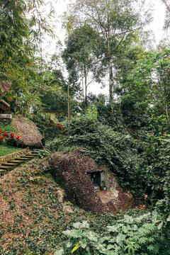 Hillside carved out for a cultural site at Objek Wisata Kalimbuang Bori, a tourist attraction in Indonesia; Bori, Sesean, North Toraja Regency, South Sulawesi, Indonesia