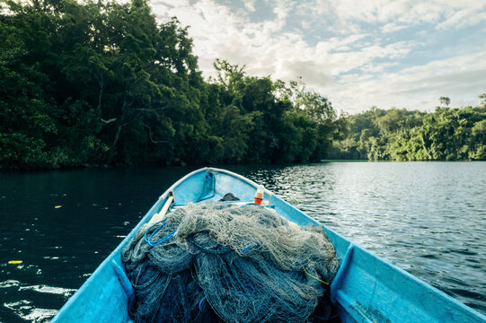 Bow of boat with fishing net along the coast of Central Sulawesi, Indonesia; Teluk Lalong, Pasir Putih, Banggai Laut, Central Sulawesi, Indonesia