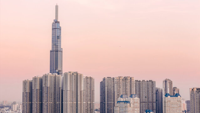 Landmark 81, a supertall skyscraper in a pink twilight sky in Ho Chi Minh City; Ho Chi Minh City, Vietnam