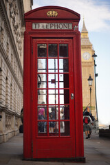 A red telephone box with Big Ben