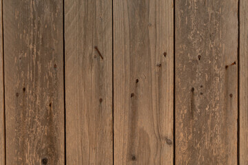 Naklejka premium Weathered wooden planks with rusty nails