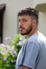 Obraz premium Young Man Smoking a Joint on a Sunny Day in Zurich