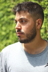 Fototapeta premium Young Tattooed Man in Sporting Clothes in the City of Zurich on a Sunny Day