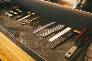 barbershop tools scissors, clippers, hair dryers, combs