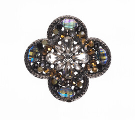 jewelry brooch with precious stones isolated on white background