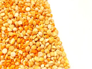 Raw split peas and red lentils portion.