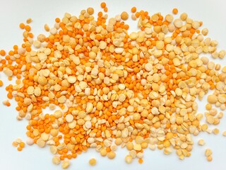Big portion of raw split peas and red lentils. 