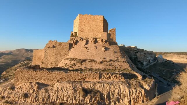 Medieval Crusaders Castle in Al Karak - Jordan, Al Kerak fortrest in arab world served as a fort for many centuries, historical ruins on a mountain above the city	