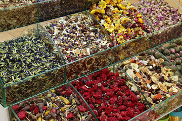 Bazaar shop of exotic and colorful oriental condiments. Aromatic herbs and food ingredients stand