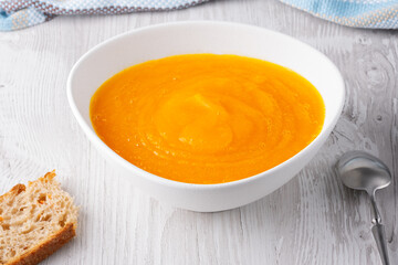 Pumpkin soup on white background