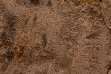A cracked weathered wall shows the passage of time