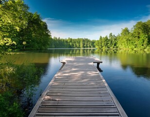 A serene lakeside scene with a wooden dock extending into the calm water, surrounded by lush